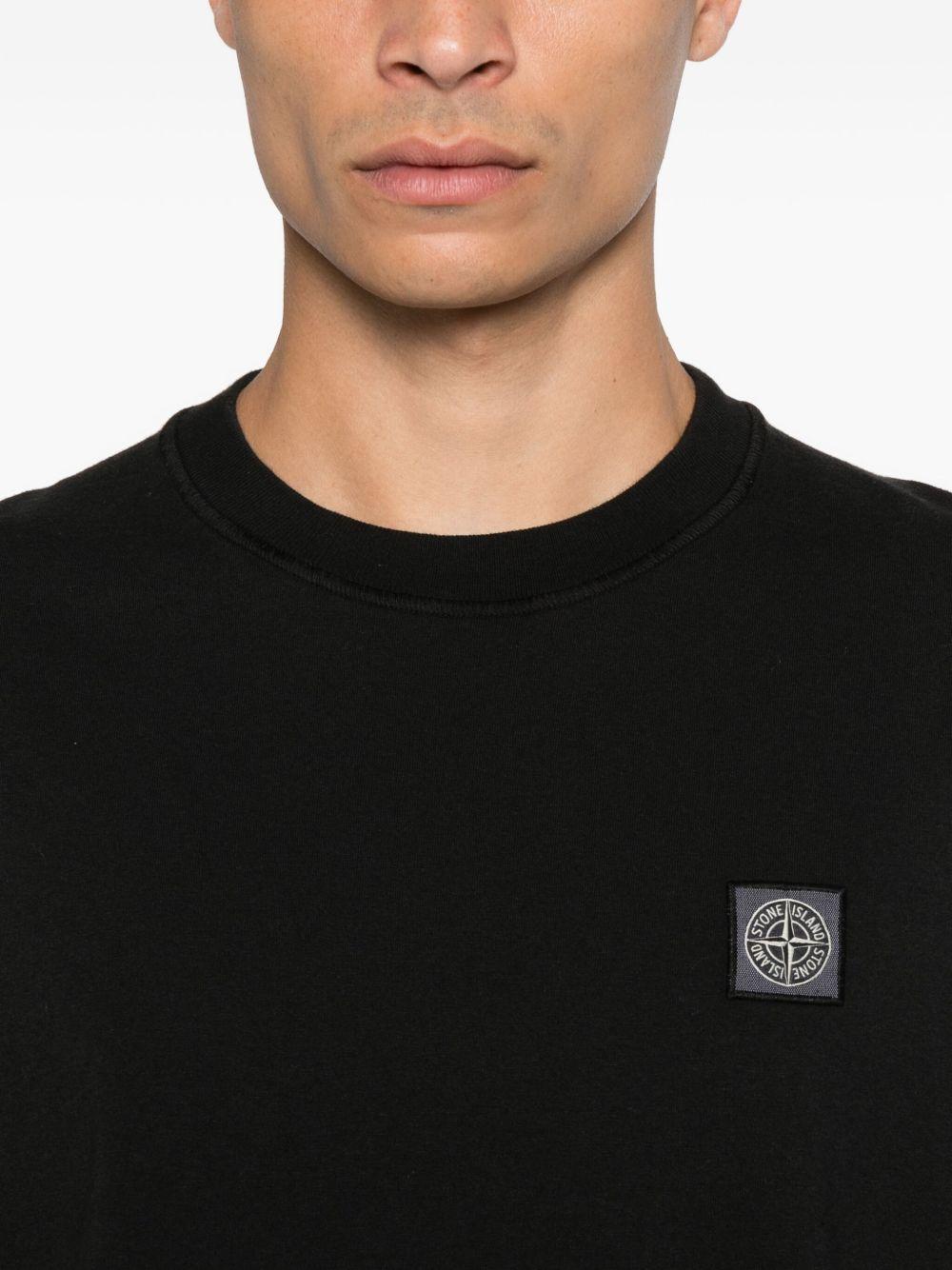 T-shirt nero con applicazione logo 