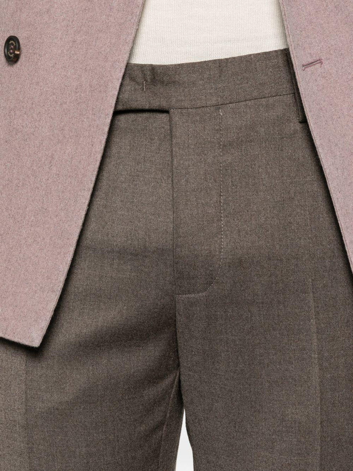 Pantaloni marrone chiaro con tasche 