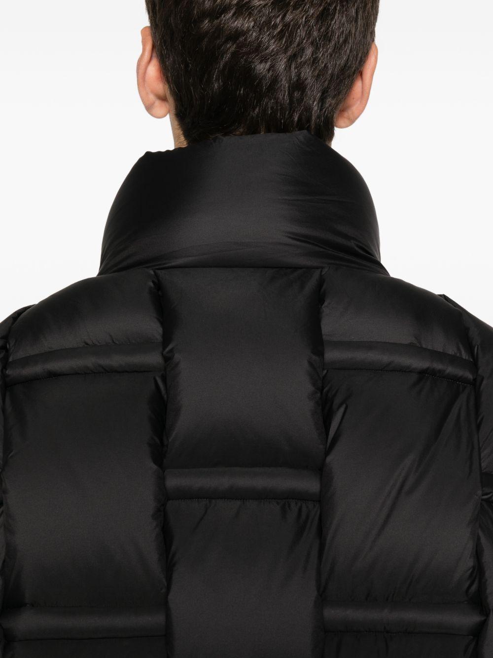 Piumino nero con inserti 
