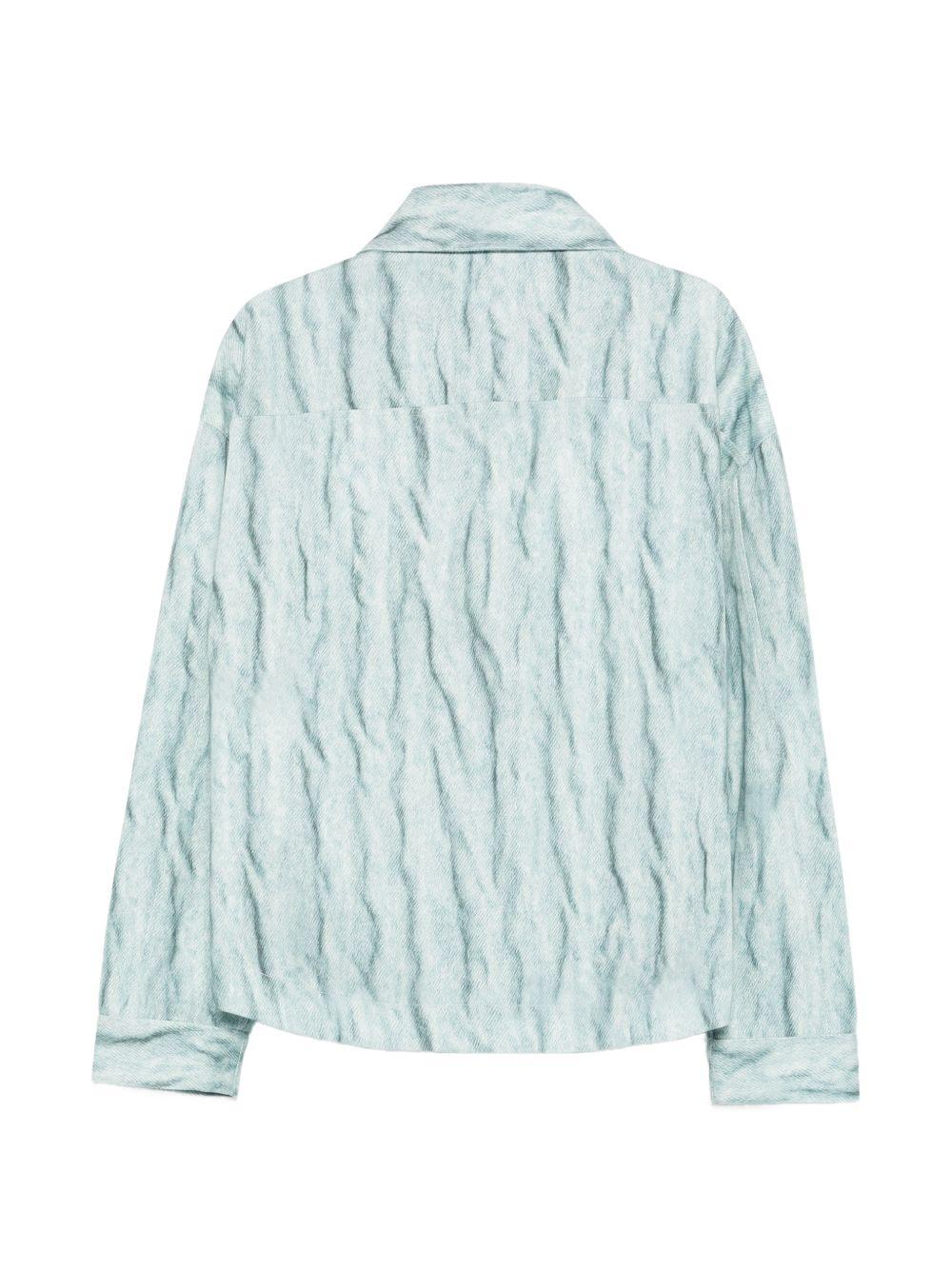 Camicia giacca azzurra con effetto stropicciato 
