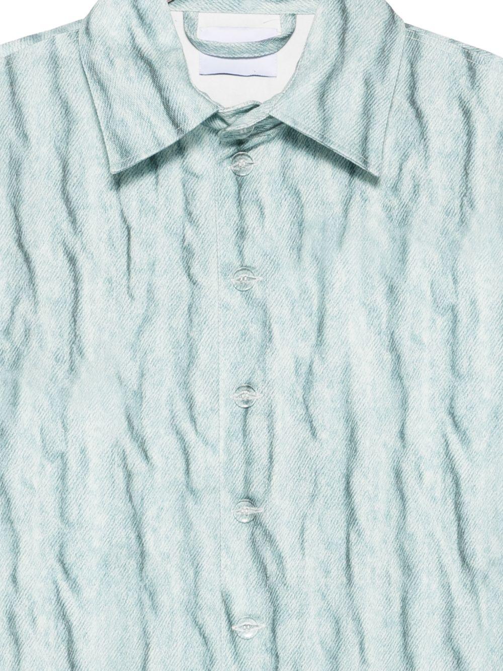 Camicia giacca azzurra con effetto stropicciato 