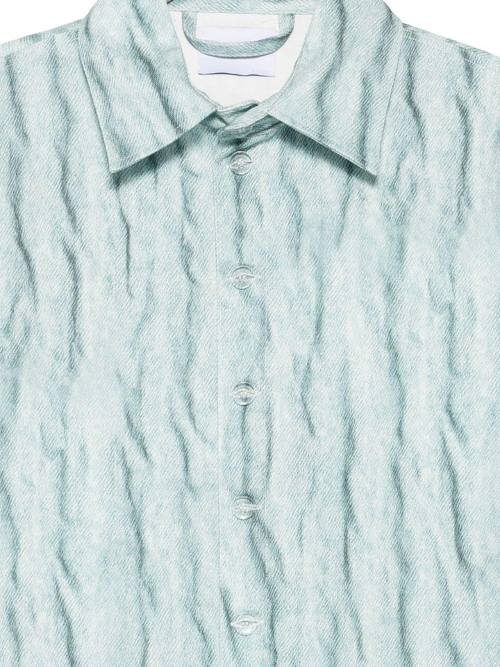 Camicia giacca azzurra con effetto stropicciato 