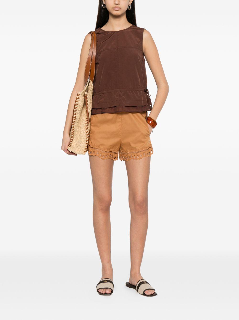 Shorts con ricami in pizzo 