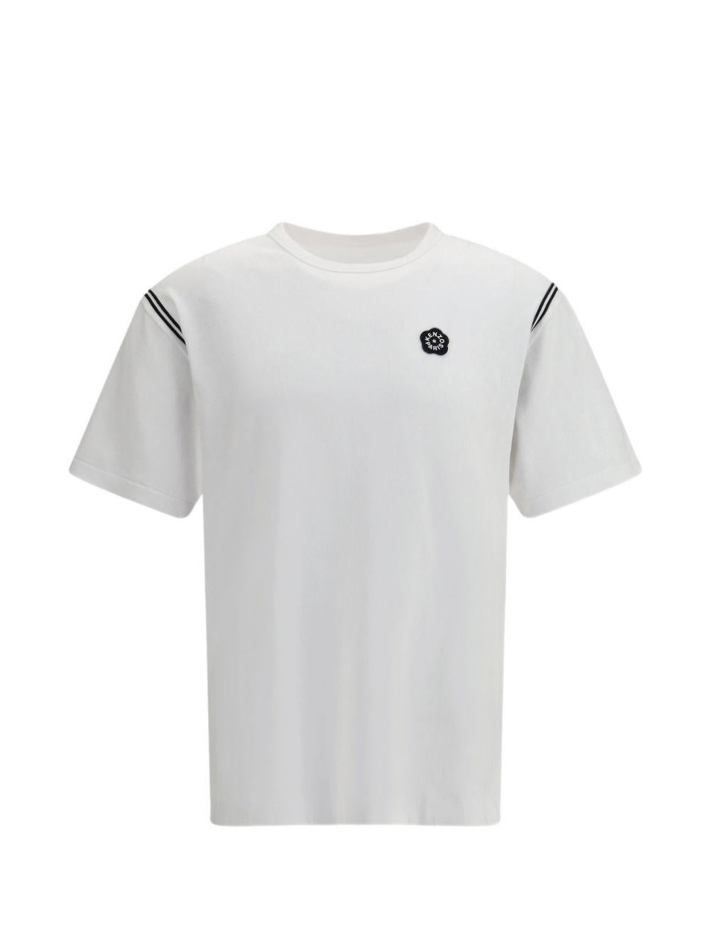 T-shirt bianca con dettaglio floreale 