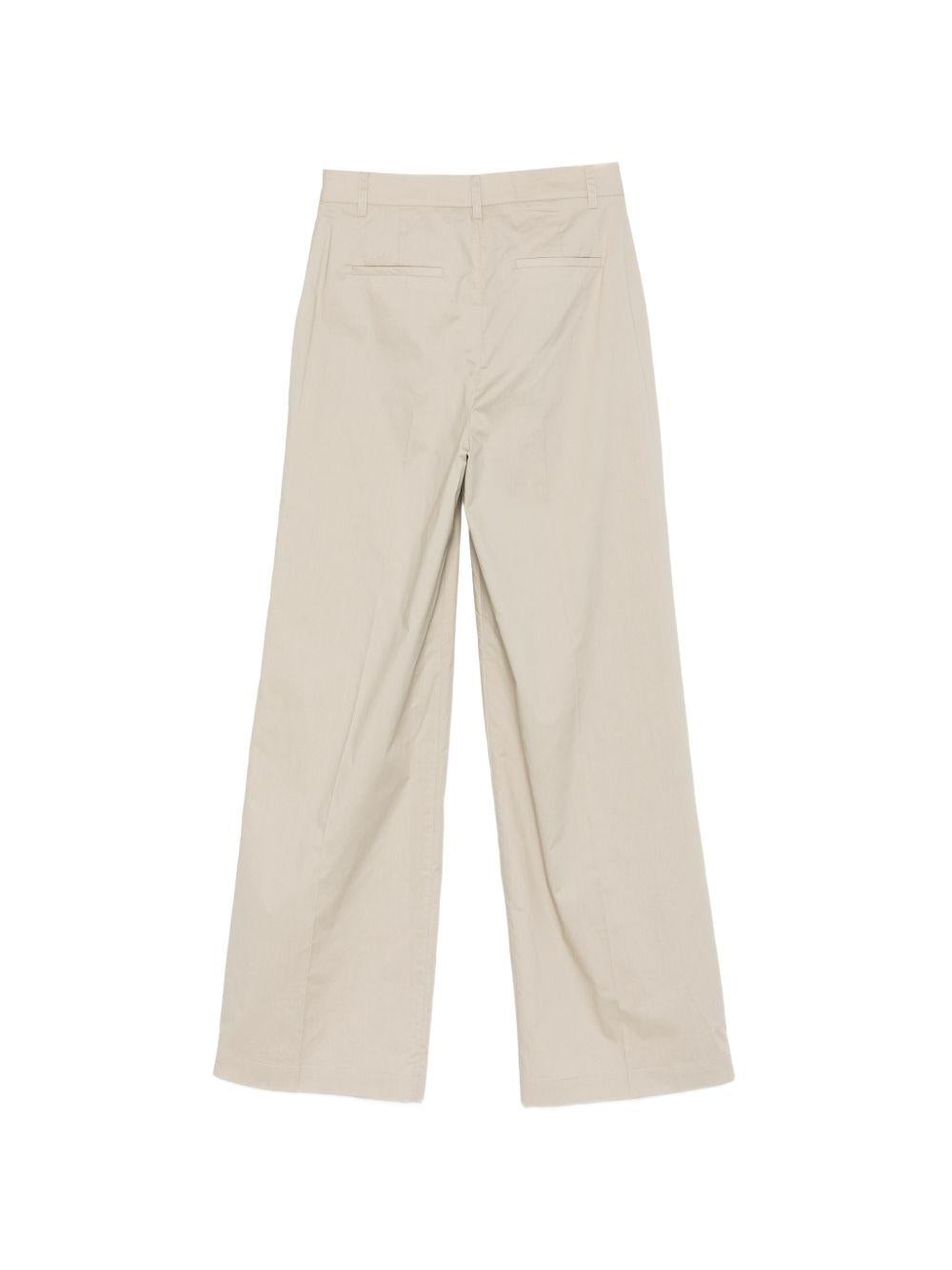 Pantaloni con logo e placca 