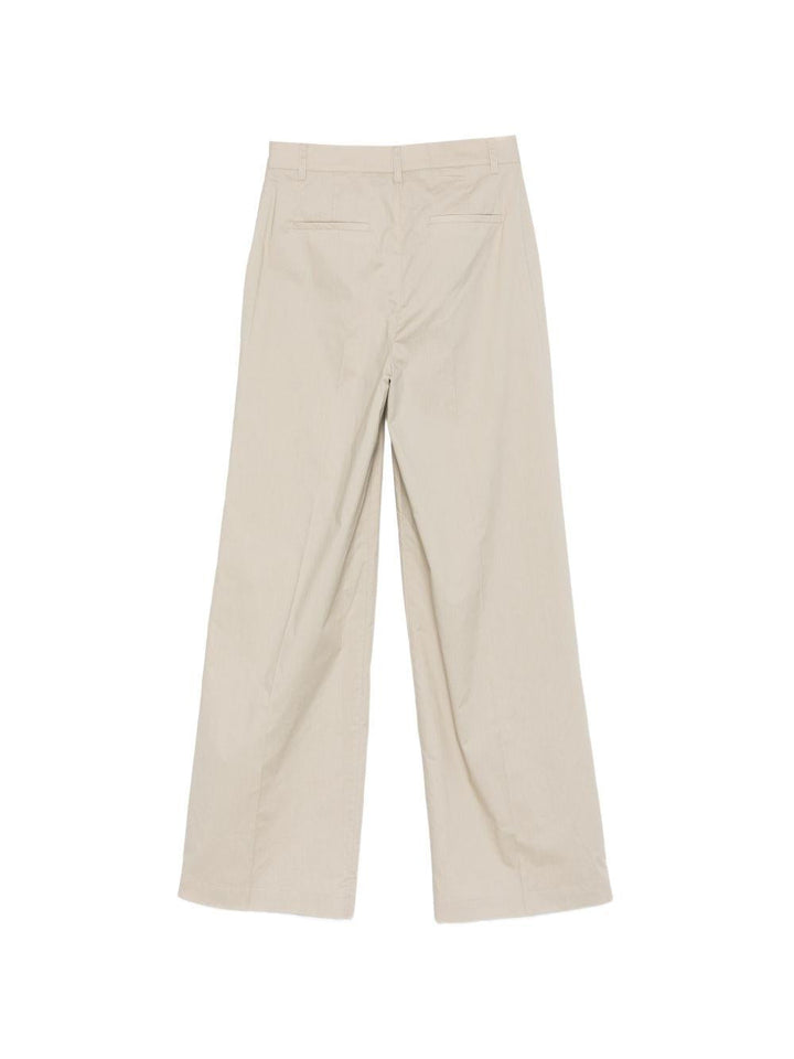 Pantaloni con logo e placca 