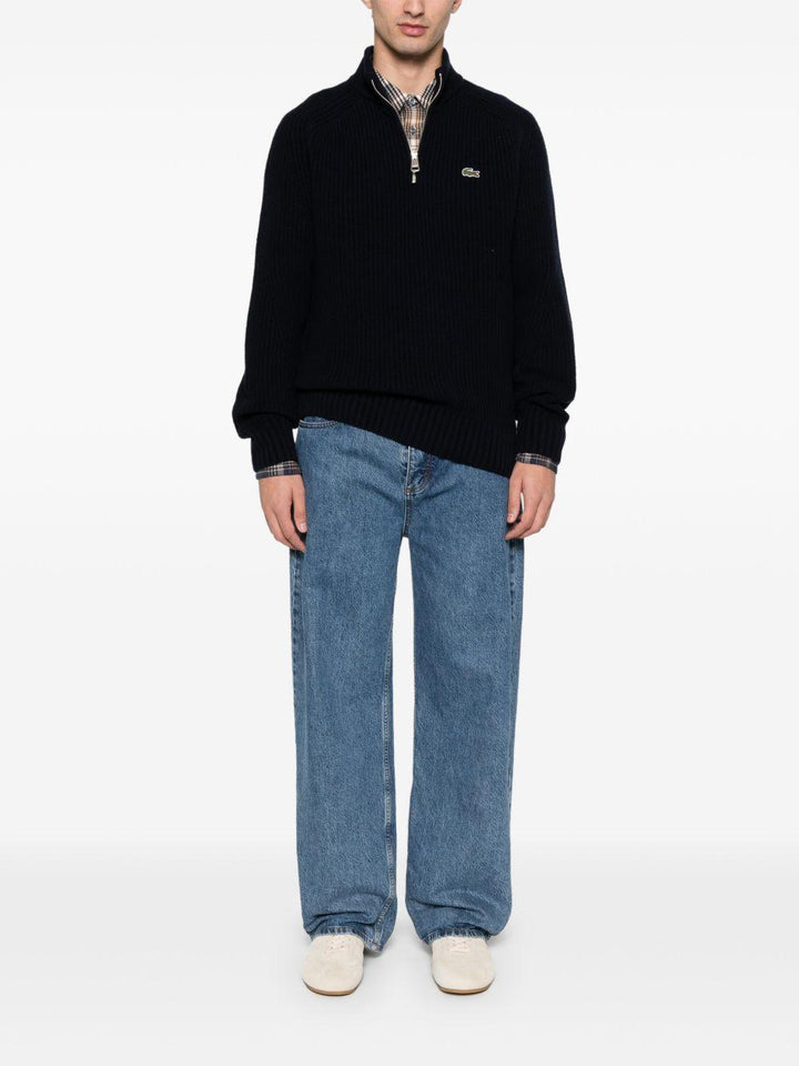 Maglione blu con applicazione 