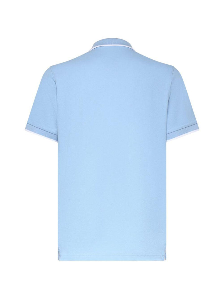 Polo azzurra con colletto a punta 
