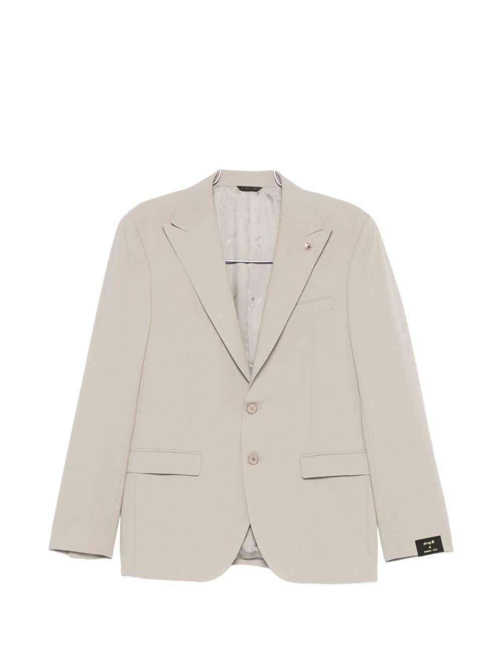 Abito beige monopetto con rever a punta 