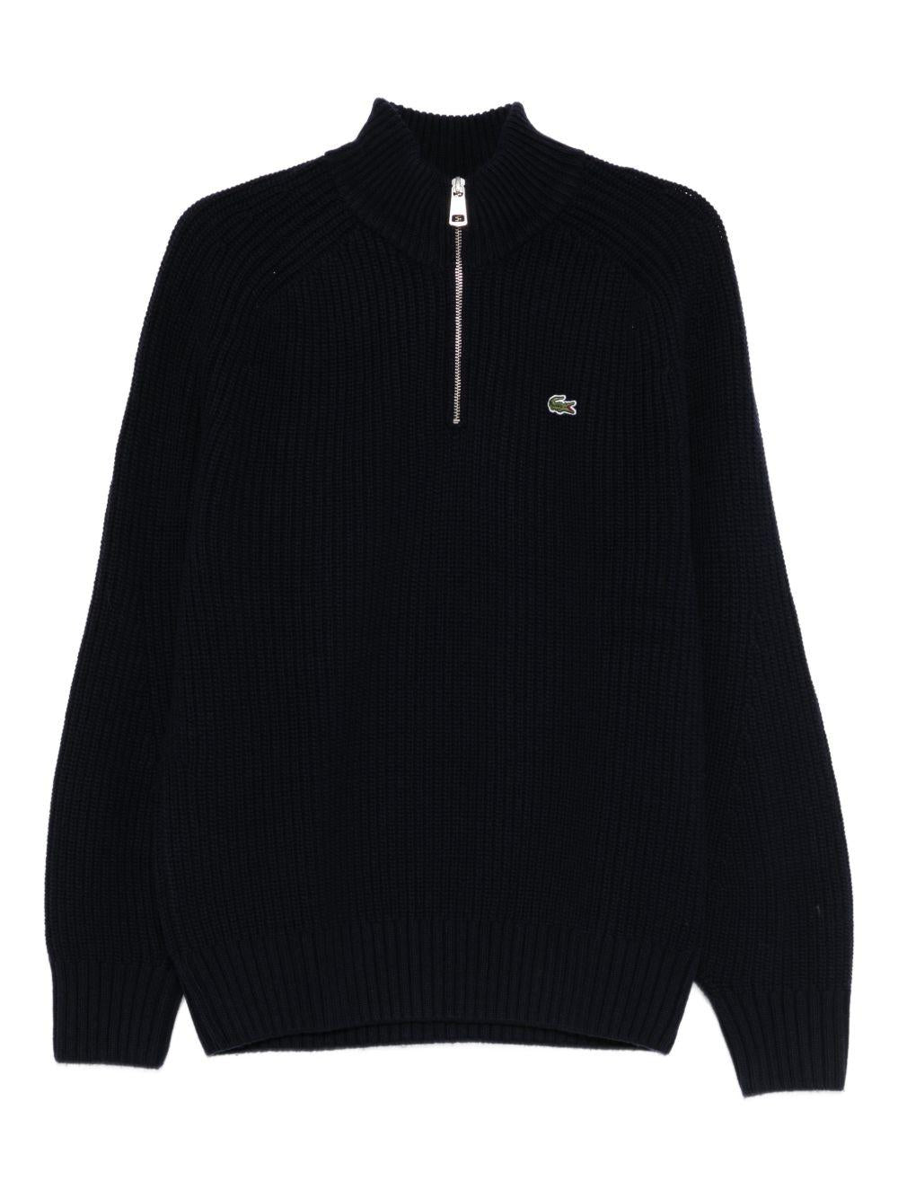 Maglione blu con applicazione 