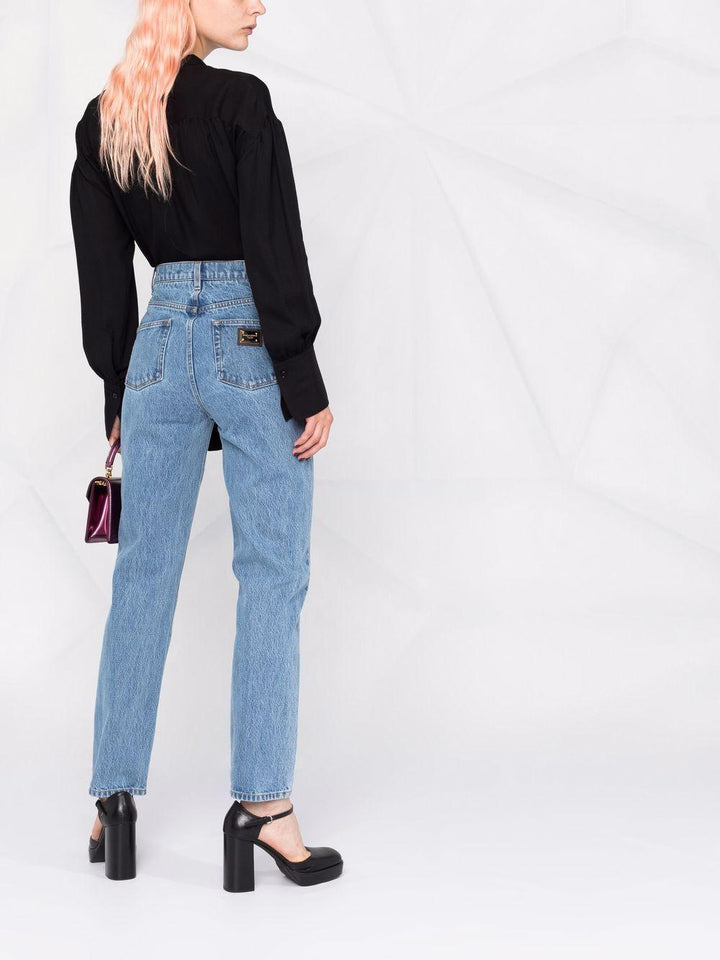 Jeans dritti con applicazione 