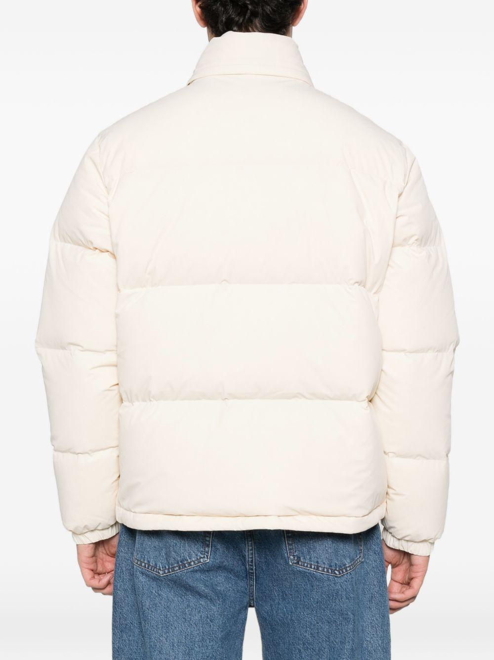 Piumino beige con zip 