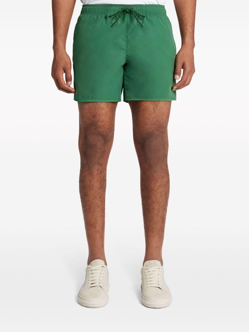 Costume da bagno verde con ricamo 