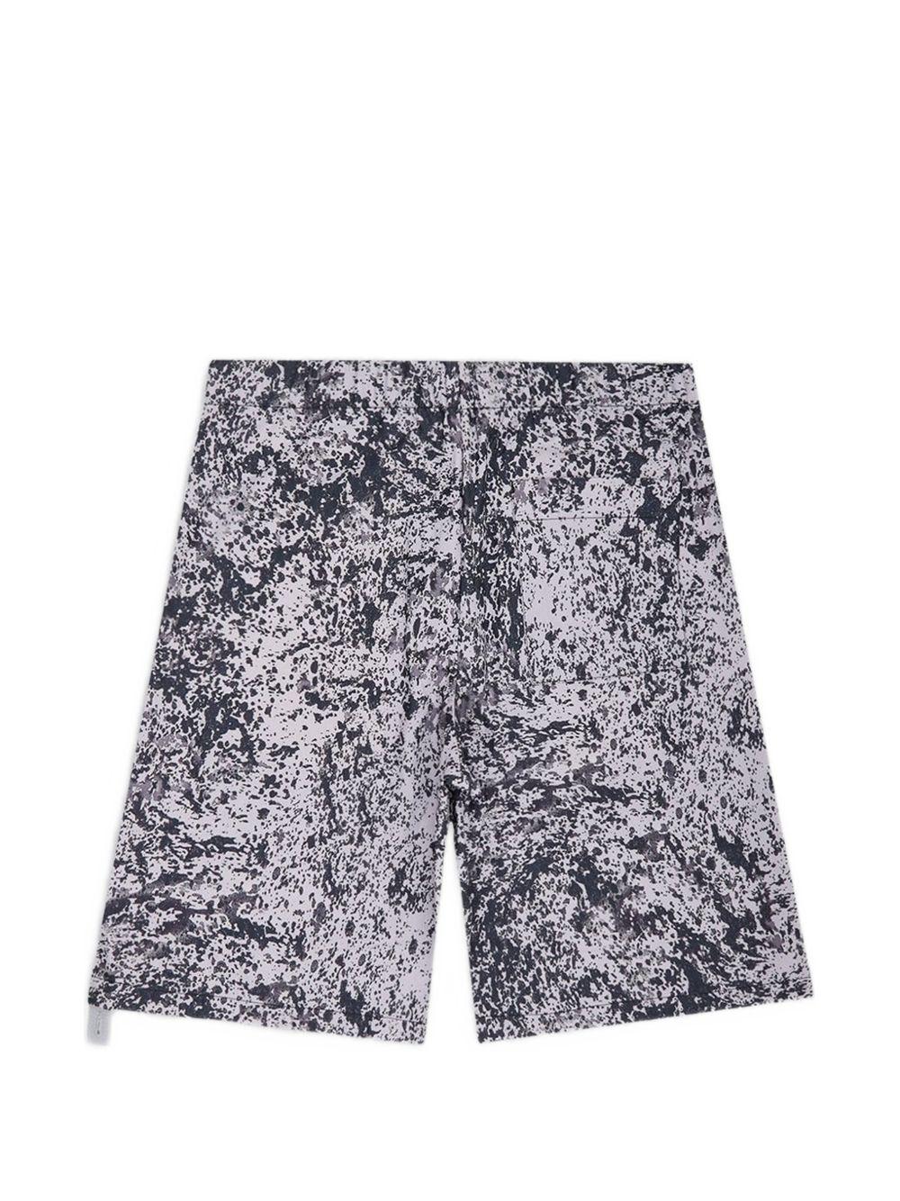 Shorts rossi con stampa 