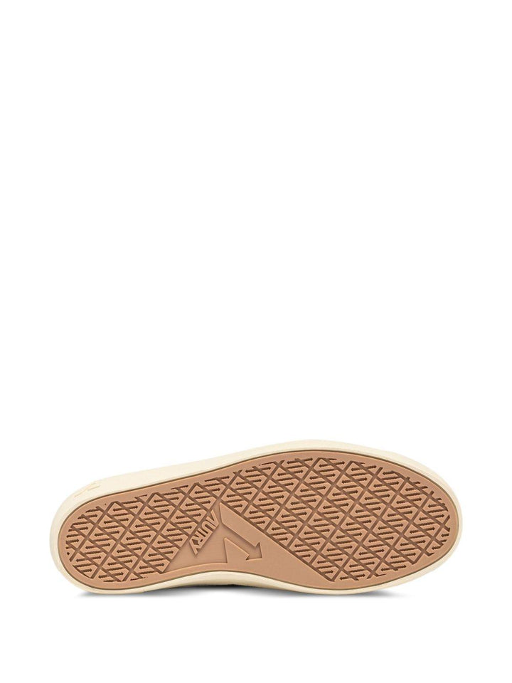 Sneakers bianche con pannelli in pelle 