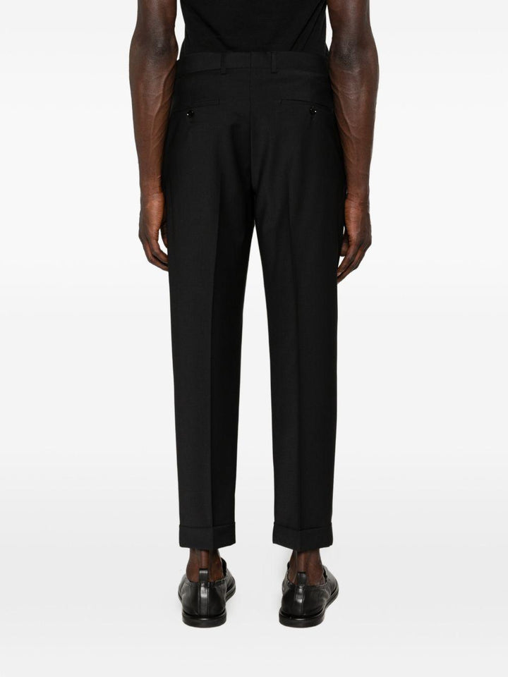 Pantaloni neri con risvolto 