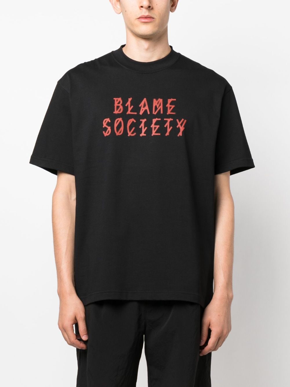 blâmer la société t-shirt noir