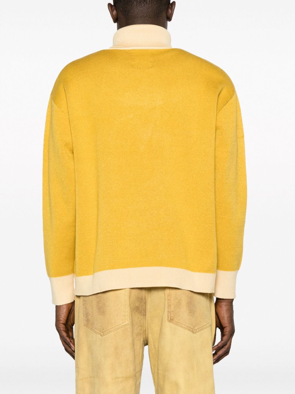 yellow sweater with intarsia print