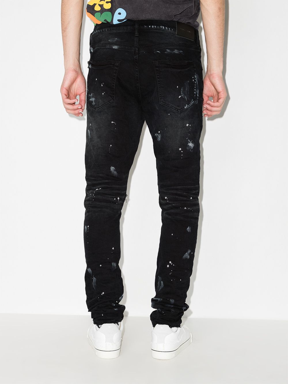 jeans skinny nero effetto vernice