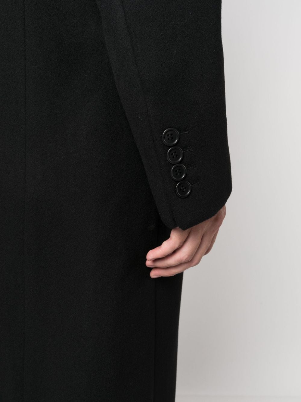 manteau noir à double boutonnage