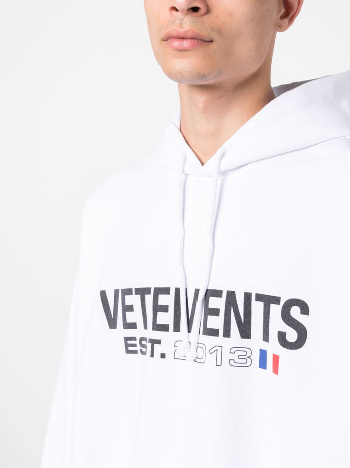 white hoodie with printed logo
