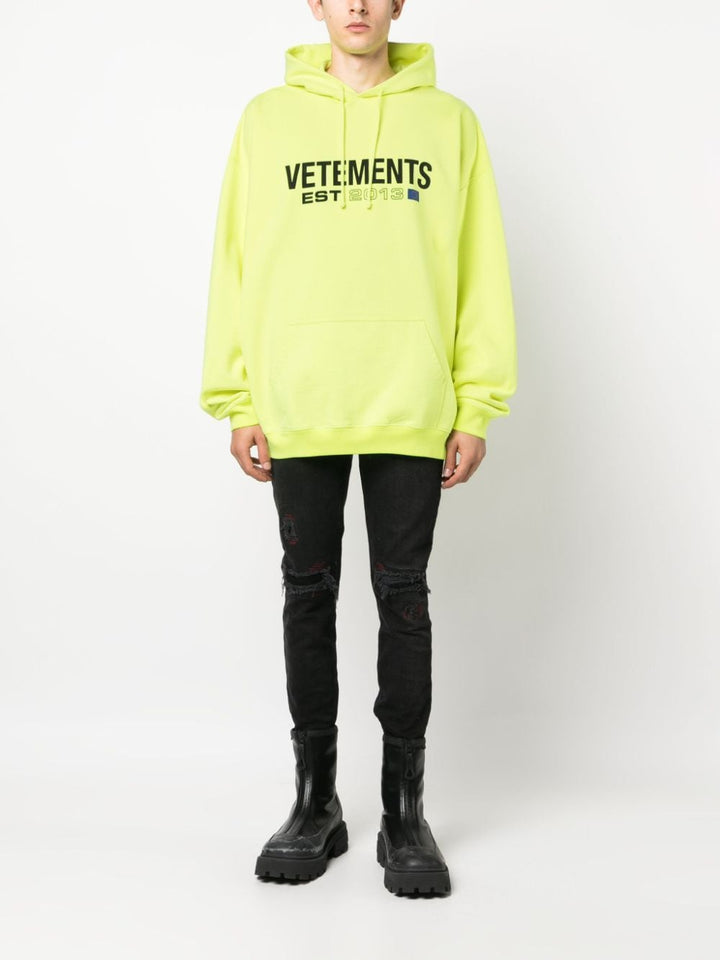 yellow hoodie with printed logo